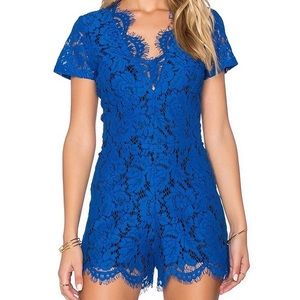 Karina Grimaldi Marina Short Sleeve Lace Romper in Black